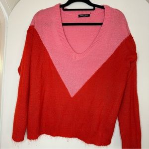 Women’s Pink and Red v neck sweater size small/medium